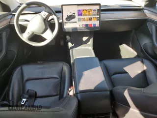 2021 Tesla Model 3 Standard Range Plus with VIN 5YJ3E1EA3MF996701, listed as a Copart auction lot 47013195 with 34,177 mi miles and Salvage Title. Bid and sale history available at carsss.com. Image 8.