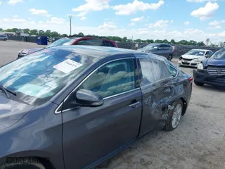 2014 Toyota Avalon Limited with VIN 4T1BK1EB3EU100754, listed as a IAAI auction lot 39446319 with 82,624 mi miles. Bid and sale history available at carsss.com. Image 6.