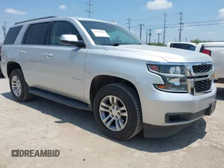 2015 Chevrolet Tahoe LT with VIN 1GNSCBKC5FR699284, listed as a IAAI auction lot 42332663 with 174,927 mi miles and . Bid and sale history available at DreamBid. Image 1.