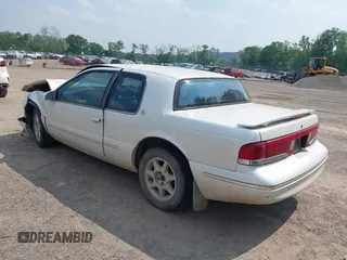 1997 Mercury Cougar z VIN 1MELM62W9VH616776, wystawiony jako IAAI lot #42411124 z przebiegiem 233 199 mil mil oraz . Historia ofert i sprzedaży dostępna na DreamBid. Obrazek 3.