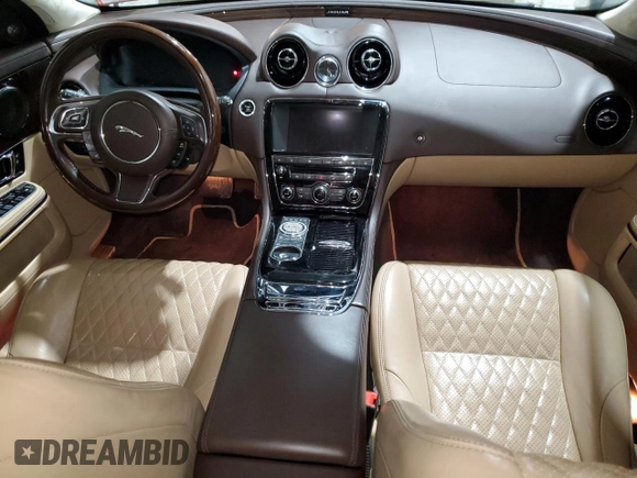 2016 Jaguar XJ with VIN SAJXJ1GD2G8V98776, listed as a Copart auction lot 41959995 with 77,391 mi miles and Salvage title. Bid and sale history available at DreamBid. Image 8.