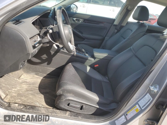 2023 Honda Civic Touring z VIN 2HGFE1F97PH323539, wystawiony jako Copart lot #48790795 z przebiegiem 24 049 mil mil oraz Szkoda całkowita • Salvage title. Historia ofert i sprzedaży dostępna na DreamBid. Obrazek 7.
