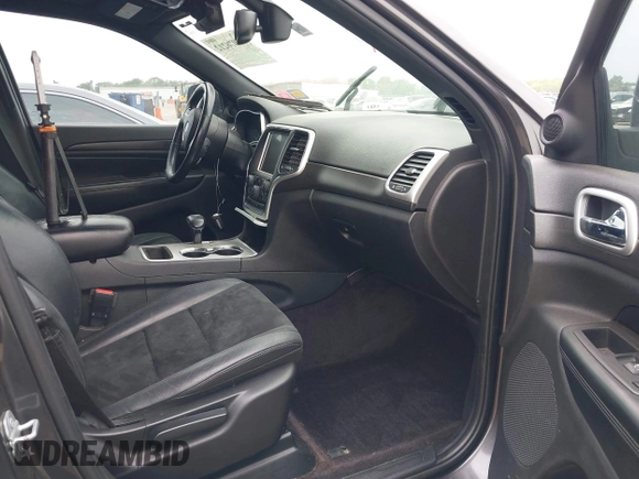 2015 Jeep Grand Cherokee Altitude with VIN 1C4RJEAG3FC219782, listed as a IAAI auction lot 42076212 with 194,910 mi miles. Bid and sale history available at carsss.com. Image 5.