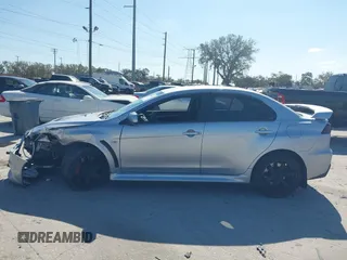 2013 Mitsubishi Lancer Evolution MR with VIN JA32W5FV6DU013470, listed as a IAAI auction lot 41544077 with 124,262 mi miles. Bid and sale history available at carsss.com. Image 14.