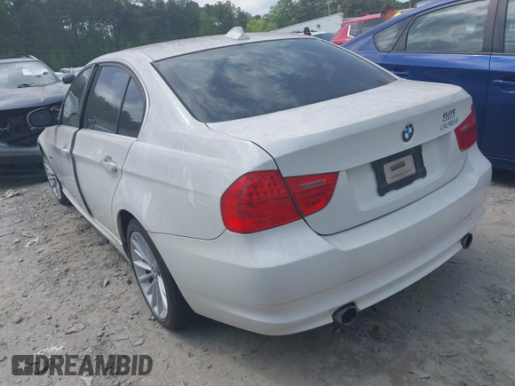 2011 BMW 3 Series 335i with VIN WBAPM5C51BE575704, listed as a IAAI auction lot 42005354 with 205,263 mi miles. Bid and sale history available at carsss.com. Image 3.