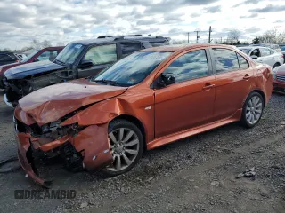 2011 Mitsubishi Lancer GTS with VIN JA32U8FW6BU011215, listed as a Copart auction lot 86357004 with 128,577 mi miles and Salvage Title. Bid and sale history available at carsss.com. Image 1.
