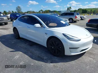 2020 Tesla Model 3 Standard Range Plus with VIN 5YJ3E1EA8LF783631, listed as a IAAI auction lot 40696383 with 78,889 mi miles. Bid and sale history available at carsss.com. Image 1.