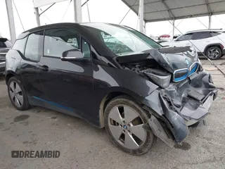 2014 BMW i3 z VIN WBY1Z2C50EV285062, wystawiony jako IAAI lot #41712683 z przebiegiem 50 327 mil mil oraz . Historia ofert i sprzedaży dostępna na DreamBid. Obrazek 1.