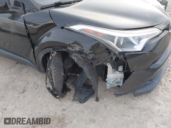 2018 Toyota C-HR XLE with VIN NMTKHMBX9JR001731, listed as a IAAI auction lot 41835918 with 138,087 mi miles. Bid and sale history available at carsss.com. Image 6.