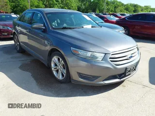 2013 Ford Taurus SEL with VIN 1FAHP2E81DG229444, listed as a IAAI auction lot 42095216 with 211,812 mi miles and . Bid and sale history available at carsss.com. Image 1.