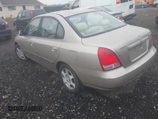 2001 Hyundai Elantra GLS z VIN KMHDN45D71U080537, wystawiony jako IAAI lot #42095959 z przebiegiem Nie podano mil oraz . Historia ofert i sprzedaży dostępna na DreamBid. Obrazek 3.