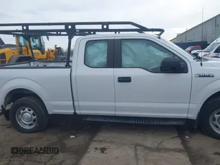 2015 Ford F-150 XLT with VIN 1FTEX1E81FFC21523, listed as a IAAI auction lot 41645827 with 116,693 mi miles. Bid and sale history available at carsss.com. Image 13.