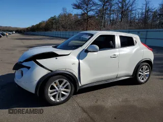 2014 Nissan Juke SL with VIN JN8AF5MV3ET355034, listed as a Copart auction lot 50761255 with 128,866 mi miles and Salvage title. Bid and sale history available at DreamBid. Image 1.