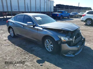 2015 Infiniti Q50 Premium with VIN JN1BV7AR2FM392399, listed as a IAAI auction lot 41978343 with 108,679 mi miles and . Bid and sale history available at DreamBid. Image 1.