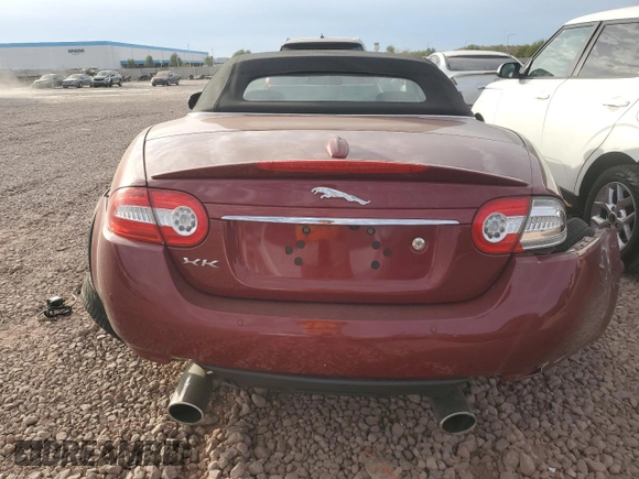 2013 Jaguar XK with VIN SAJWA4GB0DLB50530, listed as a Copart auction lot 82715724 with 24,634 mi miles and Salvage Title. Bid and sale history available at carsss.com. Image 6.