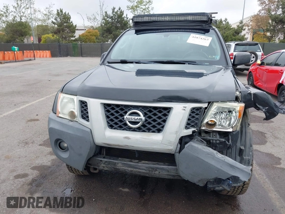 2012 Nissan Xterra S with VIN 5N1AN0NW4CC523071, listed as a IAAI auction lot 41874263 with 154,556 mi miles and . Bid and sale history available at DreamBid. Image 13.