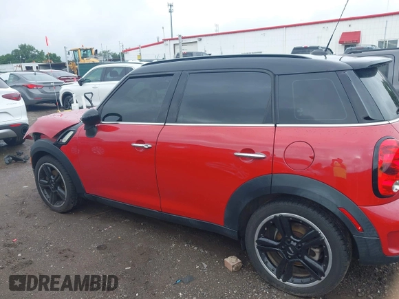 2015 MINI Countryman S with VIN WMWZC3C57FWT04338, listed as a IAAI auction lot 42524134 with 52,137 mi miles and . Bid and sale history available at DreamBid. Image 14.