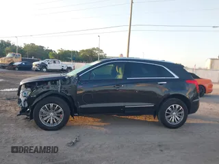 2019 Cadillac XT5 Luxury FWD with VIN 1GYKNCRS6KZ253400, listed as a IAAI auction lot 41984279 with 55,412 mi miles and . Bid and sale history available at DreamBid. Image 14.