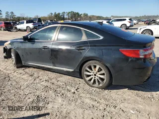 2012 Hyundai Azera z VIN KMHFH4JG0CA161867, wystawiony jako Copart lot #86928654 z przebiegiem 243 946 mil mil oraz Czysty tytuł • Clean title. Historia ofert i sprzedaży dostępna na DreamBid. Obrazek 2.