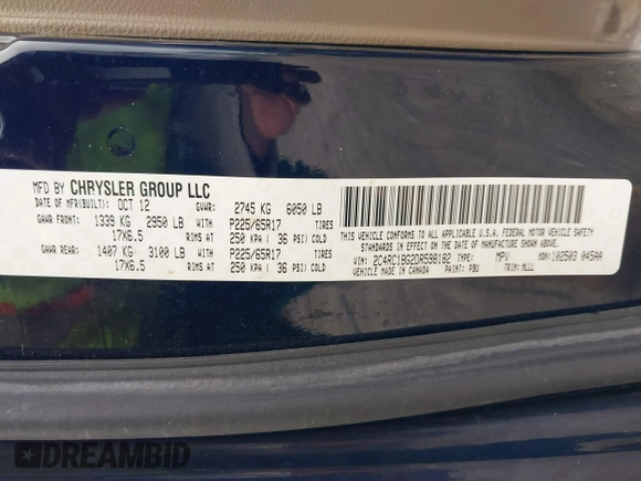 2013 Chrysler Town & Country Touring with VIN 2C4RC1BG2DR598182, listed as a IAAI auction lot 42026752 with 228,792 mi miles. Bid and sale history available at carsss.com. Image 9.
