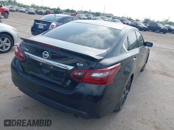 2017 Nissan Altima SR with VIN 1N4AL3AP0HC217024, listed as a IAAI auction lot 41729879 with 127,385 mi miles and . Bid and sale history available at carsss.com. Image 4.