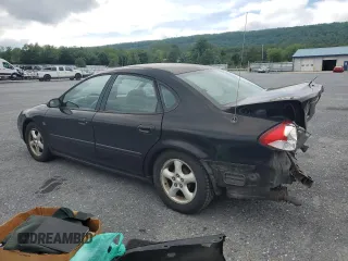 2001 Ford Taurus SEL with VIN 1FAFP56S01A258399, listed as a Copart auction lot 58963115 with 162,989 mi miles and Salvage title. Bid and sale history available at DreamBid. Image 2.