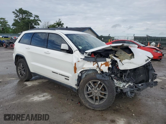 2017 Jeep Grand Cherokee 75th Anniversary with VIN 1C4RJEAG3HC696232, listed as a Copart auction lot 57362055 with 105,440 mi miles and Salvage title. Bid and sale history available at DreamBid. Image 4.