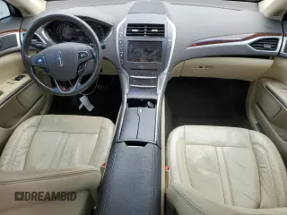 2015 Lincoln MKZ z VIN 3LN6L2J90FR601908, wystawiony jako Copart lot #55516355 z przebiegiem 127 487 mil mil oraz Szkoda całkowita • Salvage title. Historia ofert i sprzedaży dostępna na DreamBid. Obrazek 8.