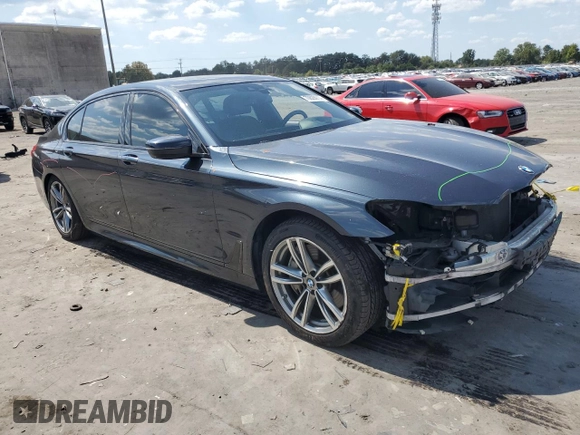 2017 BMW 7 Series with VIN WBA7F2C31HG423118, listed as a Copart auction lot 70628914 with 85,512 mi miles and Salvage Title. Bid and sale history available at DreamBid. Image 4.