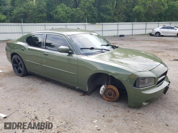 2010 Dodge Charger Police z VIN 2B3CA4CT7AH245139, wystawiony jako Copart lot #54257155 z przebiegiem 219 135 mil mil oraz Czysty tytuł • Clean title. Historia ofert i sprzedaży dostępna na DreamBid. Obrazek 4.