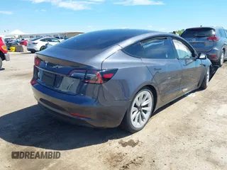 2023 Tesla Model 3 with VIN 5YJ3E1EAXPF617388, listed as a IAAI auction lot 42218748 with Not provided miles and . Bid and sale history available at DreamBid. Image 4.