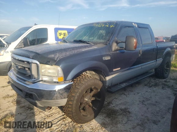 2003 Ford F-350 with VIN 1FTSW30PX3EC59706, listed as a Copart auction lot 74680424 with 155,093 mi miles and Salvage title. Bid and sale history available at DreamBid. Image 1.