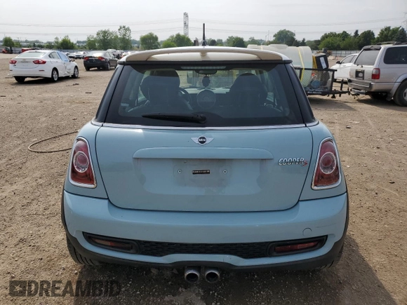 2013 MINI Hardtop S with VIN WMWSV3C52DT396033, listed as a Copart auction lot 61041585 with 83,873 mi miles and Salvage title. Bid and sale history available at DreamBid. Image 6.