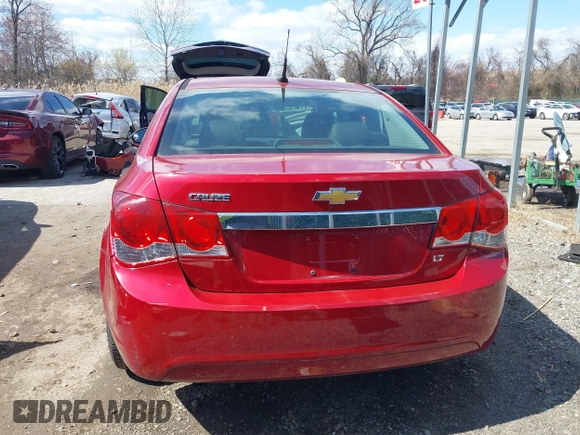 2014 Chevrolet Cruze 2LT z VIN 1G1PE5SB2E7123236, wystawiony jako IAAI lot #41882768 z przebiegiem 123 311 mil mil oraz . Historia ofert i sprzedaży dostępna na DreamBid. Obrazek 16.
