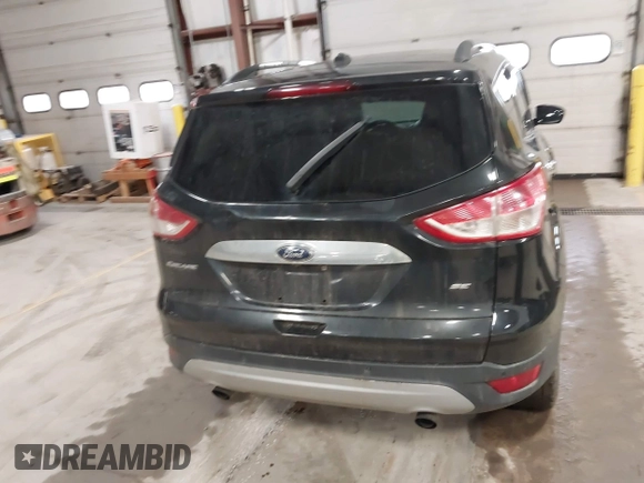 2015 Ford Escape SE with VIN 1FMCU9G9XFUA70029, listed as a IAAI auction lot 41673827 with 82,043 mi miles. Bid and sale history available at carsss.com. Image 17.