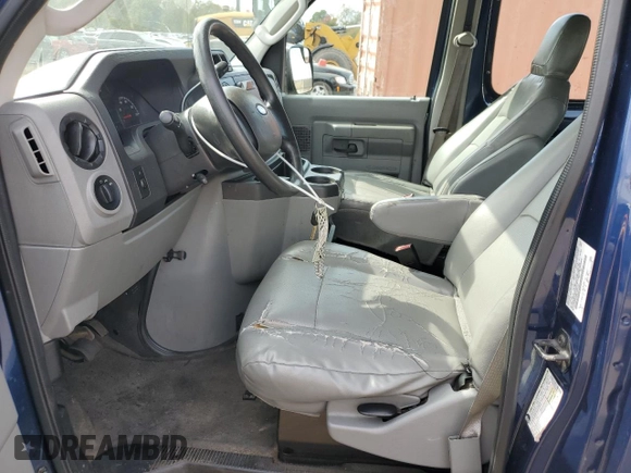2011 Ford Econoline Passenger XL with VIN 1FMNE1BW2BDA00300, listed as a Copart auction lot 74028854 with 179,955 mi miles and Salvage Title. Bid and sale history available at DreamBid. Image 7.