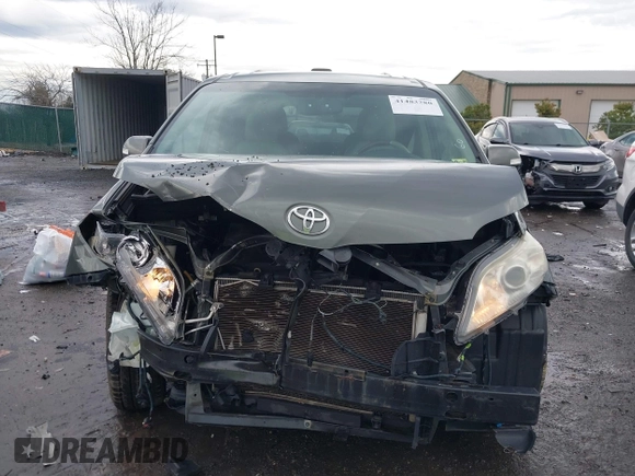 2013 Toyota Sienna XLE with VIN 5TDDK3DC7DS068591, listed as a IAAI auction lot 41483280 with 197,599 mi miles and . Bid and sale history available at DreamBid. Image 13.