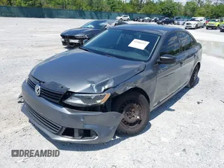 2014 Volkswagen Jetta S z VIN 3VW2K7AJ6EM253571, wystawiony jako IAAI lot #42186222 z przebiegiem 171 518 mil mil oraz . Historia ofert i sprzedaży dostępna na DreamBid. Obrazek 17.