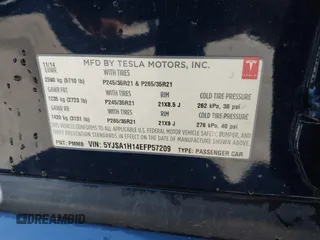 2014 Tesla Model S 60 with VIN 5YJSA1H14EFP57209, listed as a IAAI auction lot 41305157 with 141,364 mi miles and . Bid and sale history available at DreamBid. Image 9.