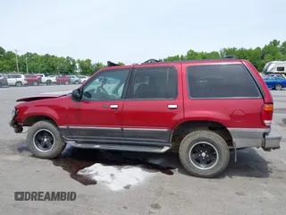 2000 Ford Explorer XLT z VIN 1FMZU73E7YZB60956, wystawiony jako IAAI lot #42218666 z przebiegiem 234 289 mil mil oraz . Historia ofert i sprzedaży dostępna na DreamBid. Obrazek 15.