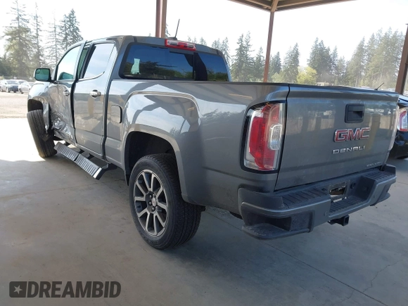 2021 GMC Canyon 4WD Denali with VIN 1GTG6EEN5M1102747, listed as a IAAI auction lot 42121134 with 60,412 mi miles and . Bid and sale history available at DreamBid. Image 3.