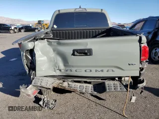 2023 Toyota Tacoma SR z VIN 3TMCZ5AN8PM619866, wystawiony jako Copart lot #48289915 z przebiegiem 17 547 mil mil oraz Szkoda całkowita • Salvage title. Historia ofert i sprzedaży dostępna na DreamBid. Obrazek 6.