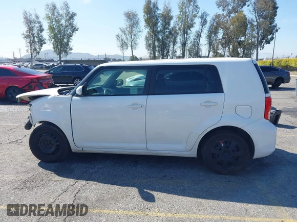 2014 Scion xB with VIN JTLZE4FE5EJ065953, listed as a IAAI auction lot 41850554 with 124,856 mi miles. Bid and sale history available at carsss.com. Image 15.