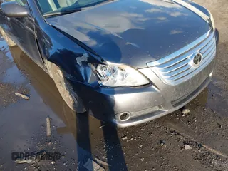 2008 Toyota Avalon XL with VIN 4T1BK36B18U311398, listed as a IAAI auction lot 40932176 with 272,607 mi miles. Bid and sale history available at carsss.com. Image 6.