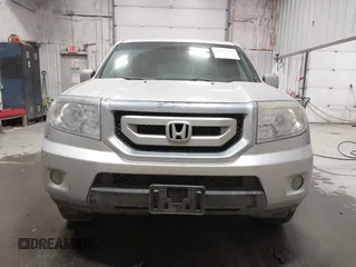 2011 Honda Pilot EX-L with VIN 5FNYF4H66BB029802, listed as a IAAI auction lot 42101545 with 240,127 mi miles and . Bid and sale history available at carsss.com. Image 12.