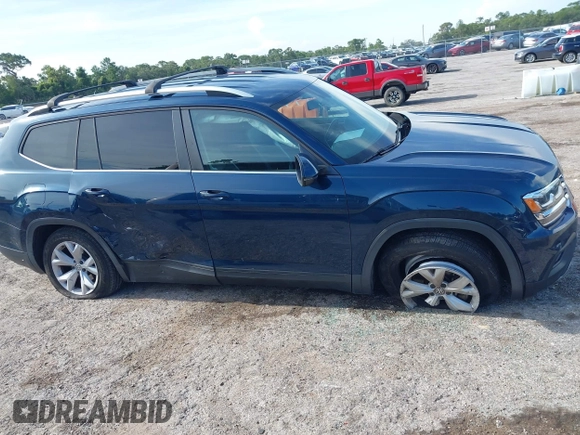 2018 Volkswagen Atlas SE with VIN 1V2CR2CA1JC561003, listed as a IAAI auction lot 42556798 with 124,147 mi miles and . Bid and sale history available at DreamBid. Image 13.