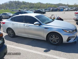 2019 Kia Optima LX with VIN 5XXGT4L39KG323046, listed as a IAAI auction lot 42035766 with 164,643 mi miles and . Bid and sale history available at DreamBid. Image 13.