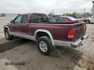 2001 Dodge Dakota Sport z VIN 1B7GG22N81S152399, wystawiony jako Copart lot #58543135 z przebiegiem 218 133 mil mil oraz Szkoda całkowita • Salvage title. Historia ofert i sprzedaży dostępna na DreamBid. Obrazek 2.