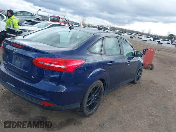 2016 Ford Focus SE with VIN 1FADP3F27GL254679, listed as a IAAI auction lot 41941314 with 72,609 mi miles. Bid and sale history available at carsss.com. Image 4.