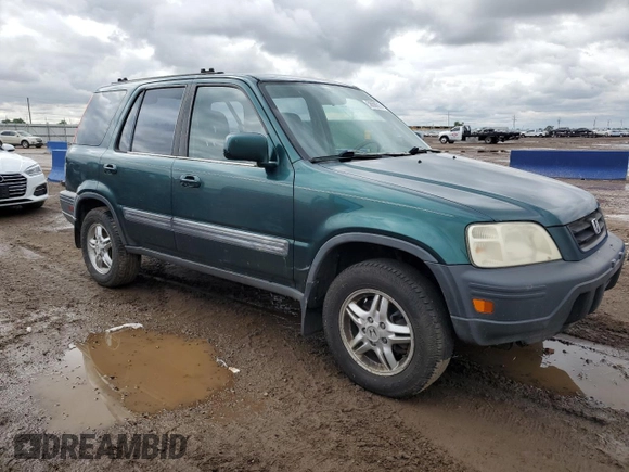 1999 Honda CR-V EX z VIN JHLRD1869XC064785, wystawiony jako Copart lot #58666215 z przebiegiem 241 633 mil mil oraz Czysty tytuł • Clean title. Historia ofert i sprzedaży dostępna na DreamBid. Obrazek 4.